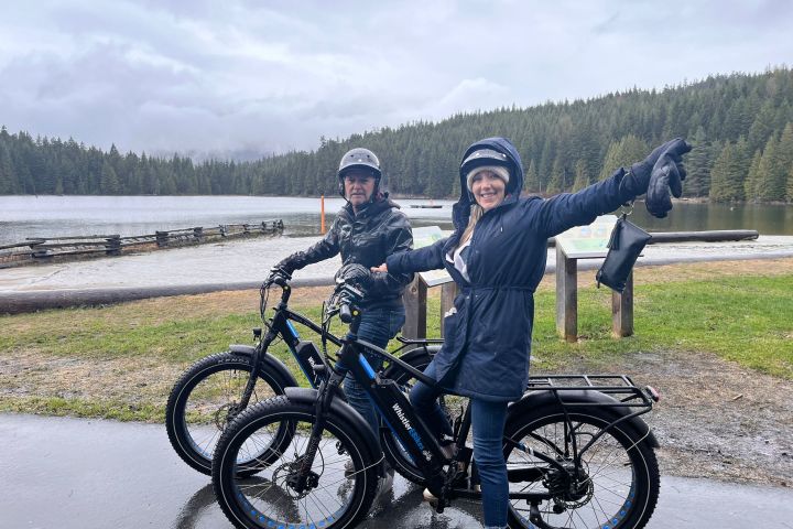 a man riding a motorcycle posing for the camera